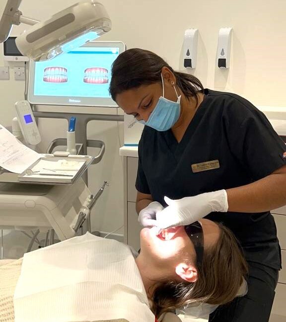 dentist examining a patients mouth
