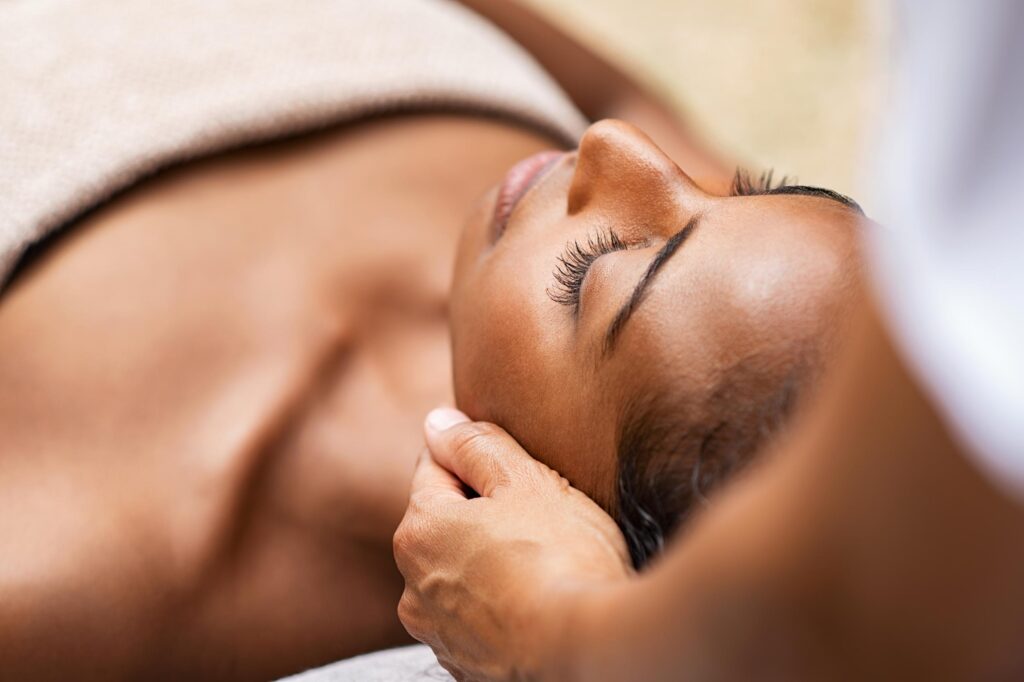 A woman enjoying a facial treatment